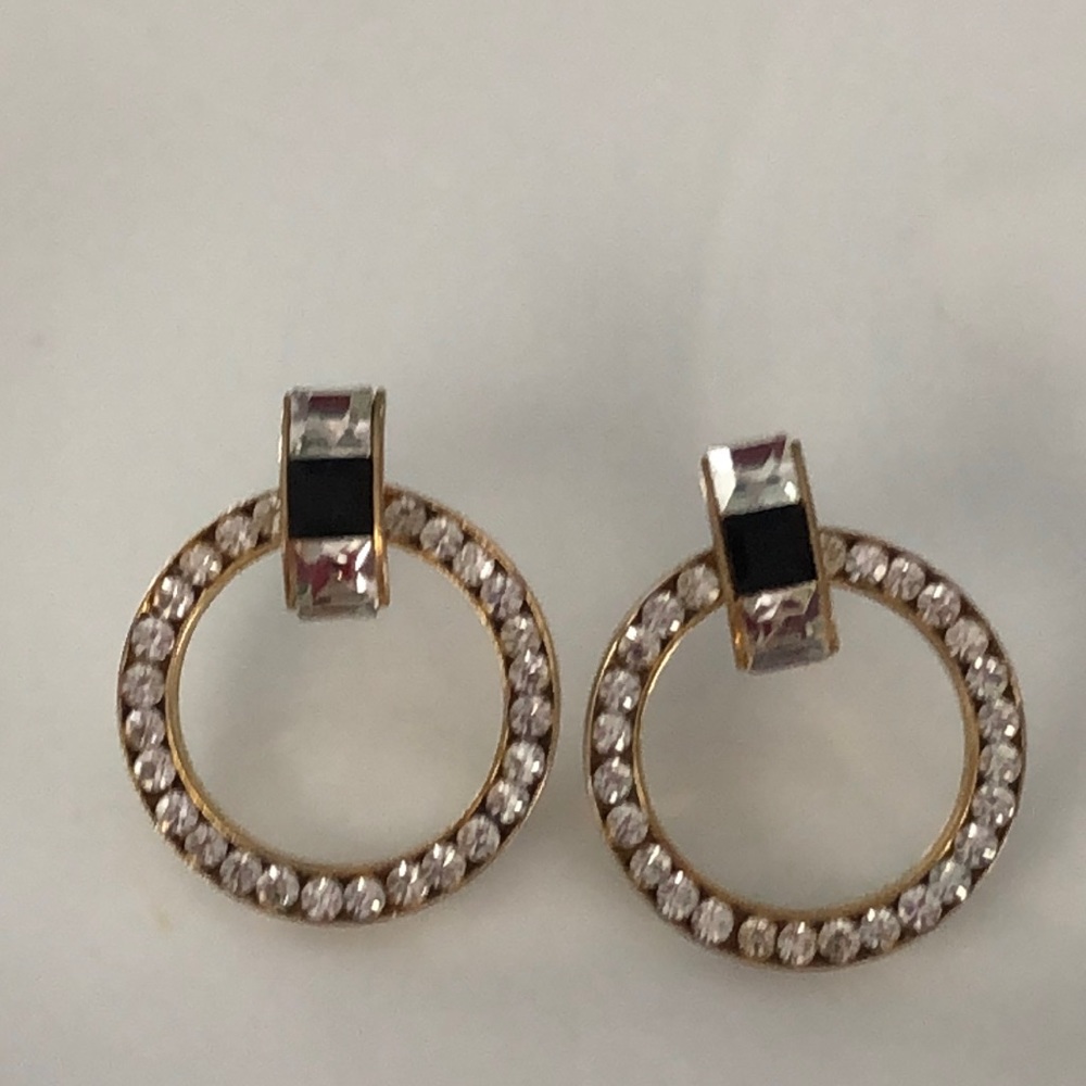Circular crystal and baguette clear and black stone goldtone earrings